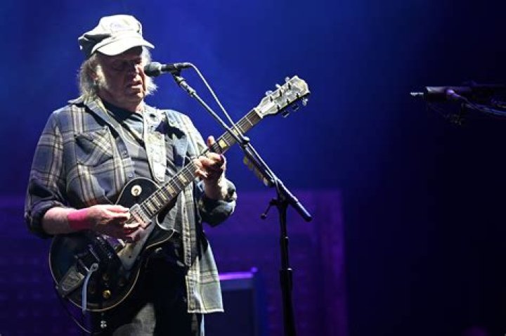 Uncover The Timeless Message Of Neil Young's "Keep On Rockin' In The Free World"