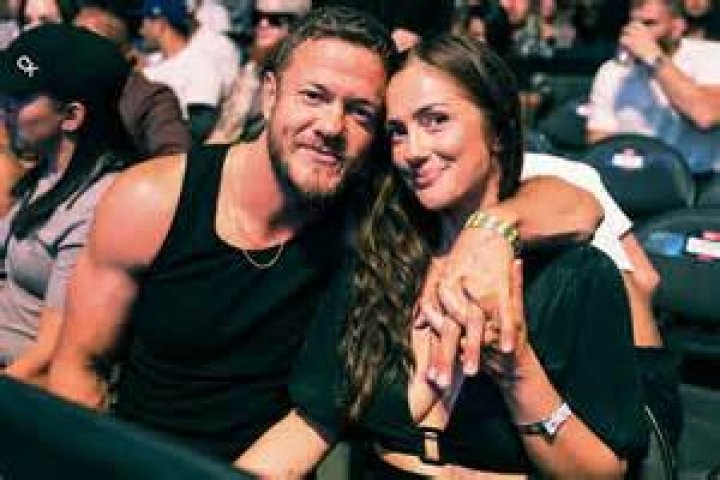 Unveiling The Secrets Of Dan Reynolds' Towering Stature